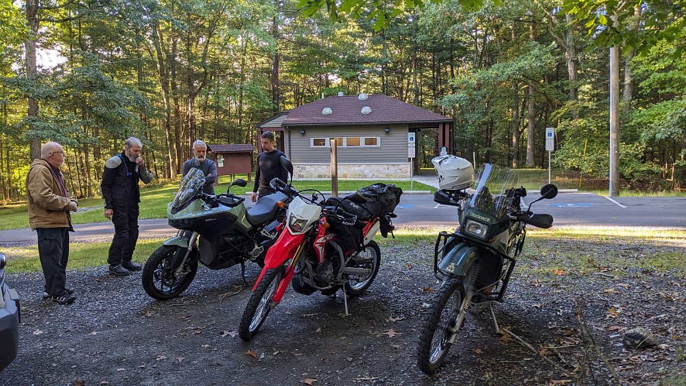 riders look at the Zero before the ride