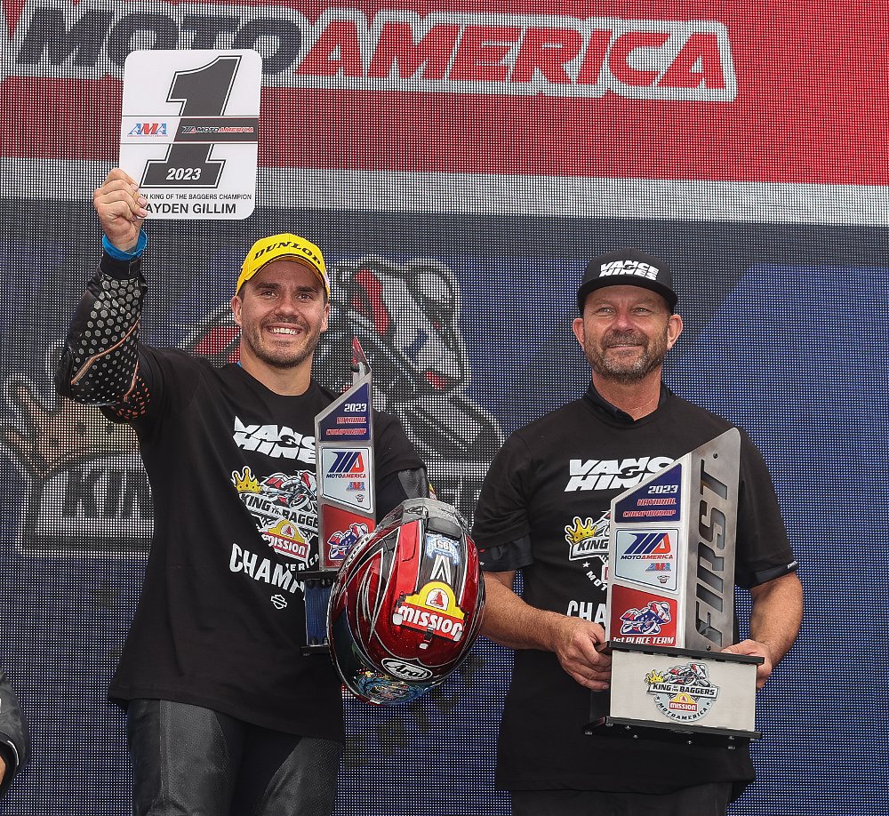 Hayden Gillim holding number one plate for winning King of the Baggers championship