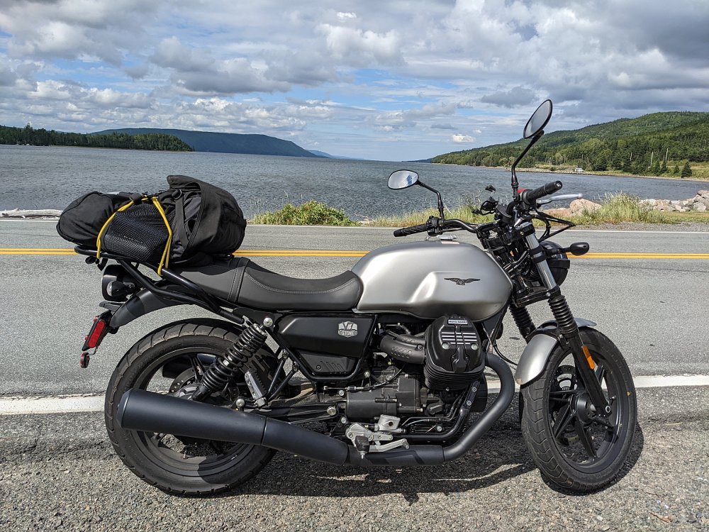 the Moto Guzzi loaded up and on the road