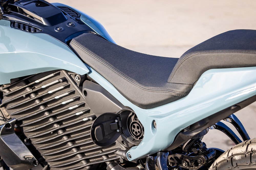 2024 LiveWire Del Mar seat and charge port detail.