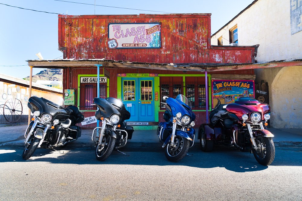 motorcycles parked at a colorful storefront in Oatman, Arizona