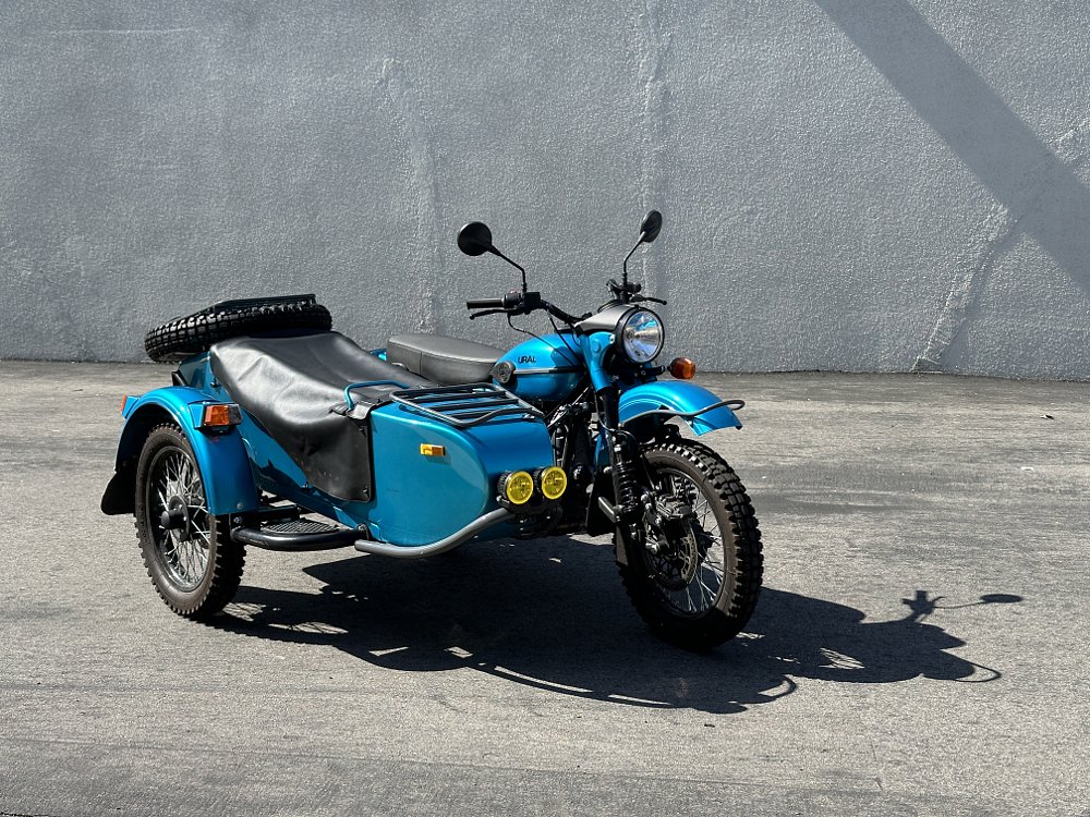 2024 Ural Gear Up parked in an industrial lot.