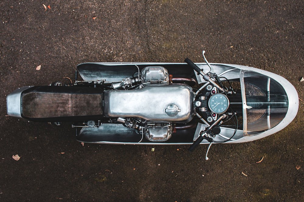 overhead view, looking down inside the large fairing to see the Moto Guzzi cylinders sticking out on both sides
