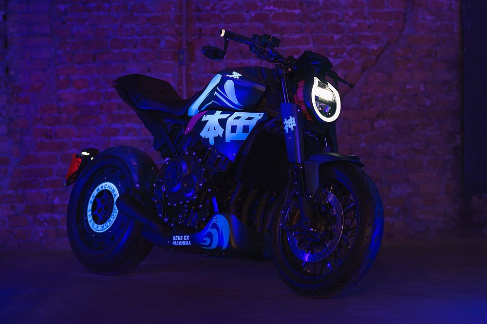 custom CB1000R glowing in blacklight, showing Japanese characters