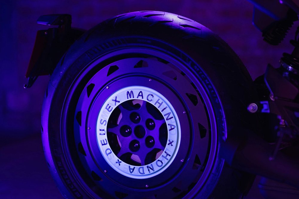 closeup of rear wheel glowing in blacklight