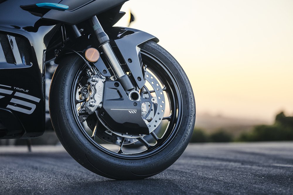 close view of front wheel and suspension