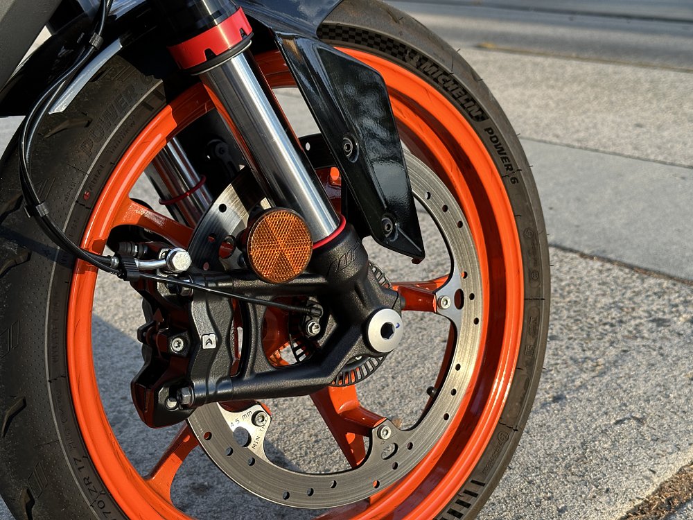 2024 KTM 390 Duke front brake detail.