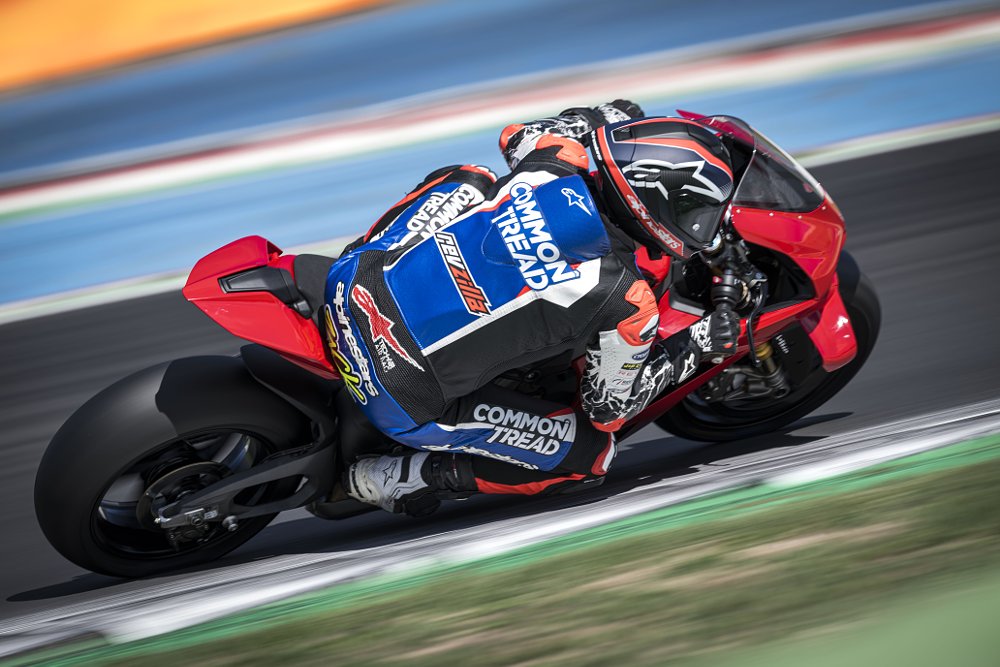 2025 Ducati Panigale V4 S turning right on a race track.