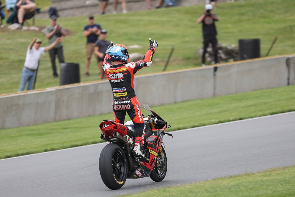 Herrin celebrating his win at Road America on the victory lap