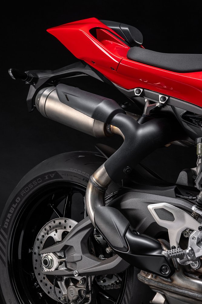 view of tail section of Streetfighter with exhaust pipes underneath the tail and with black heat guards