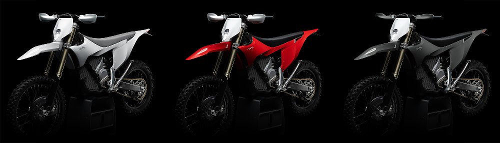 The Stark VARG EX lineup pictured in Snow White, Stark Red, and Forest Grey liveries.