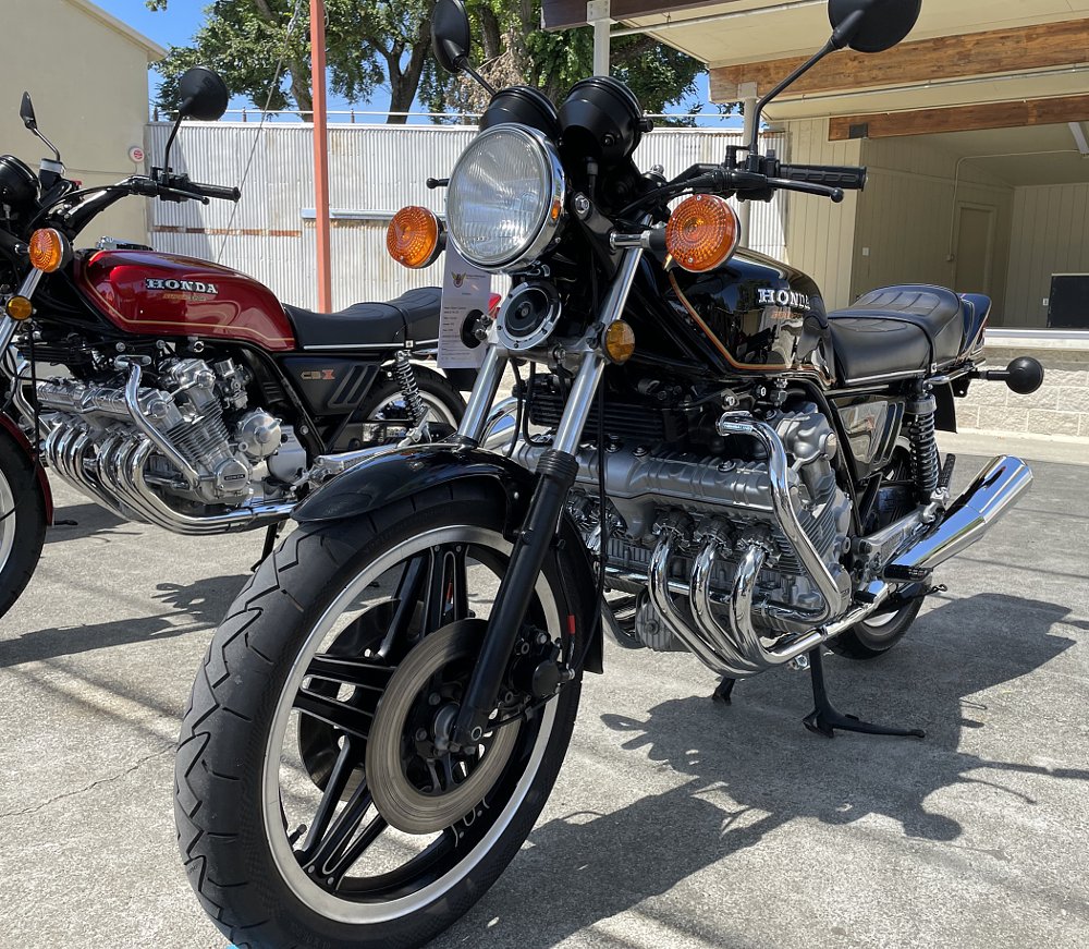 low angle front view of the 1980 CBX showing the row of chromed exhaust pipes emerging from the engine block