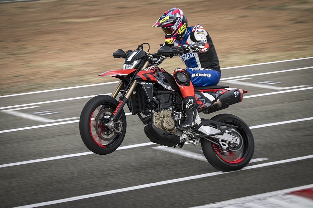 Zack wheelying the Hypermotard 698 Mono on a roadrace track