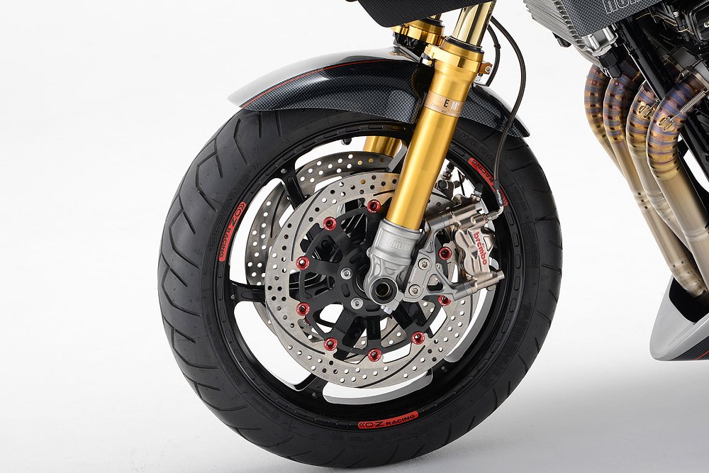 closeup of front wheel and Brembo brakes