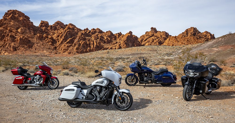 four PowerPlus models parked in front of red rock mountains