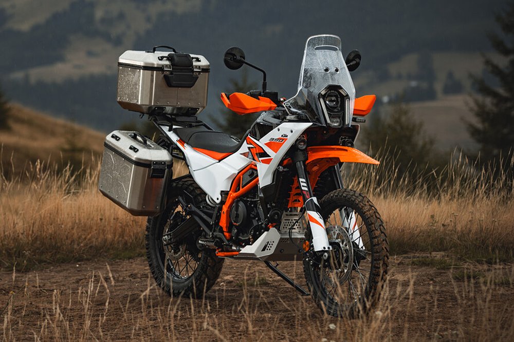 A front-right view of KTM's 390 Adventure R with mountains in the background.