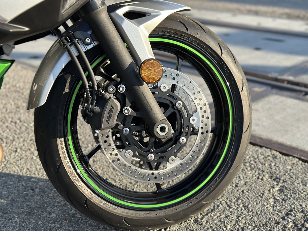2025 Kawasaki Ninja 7 Hybrid front wheel detail.