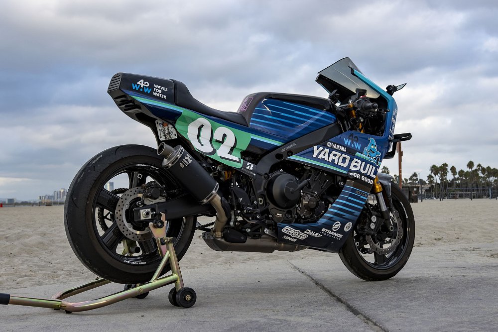 rear three quarters view of the custom on a track stand