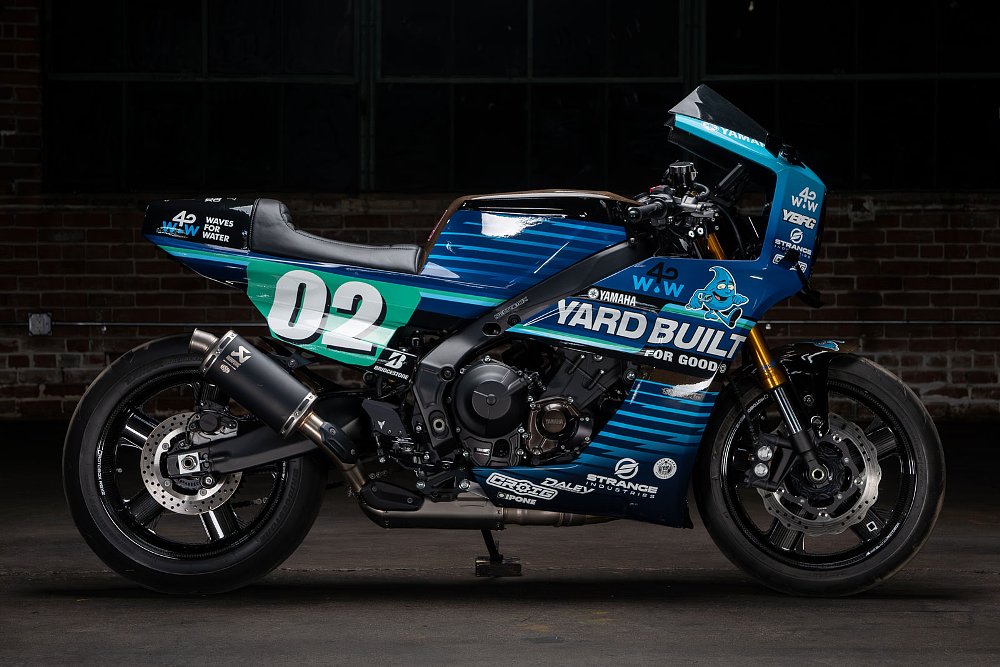 Yardbuilt custom with blue racing style bodywork with stickers