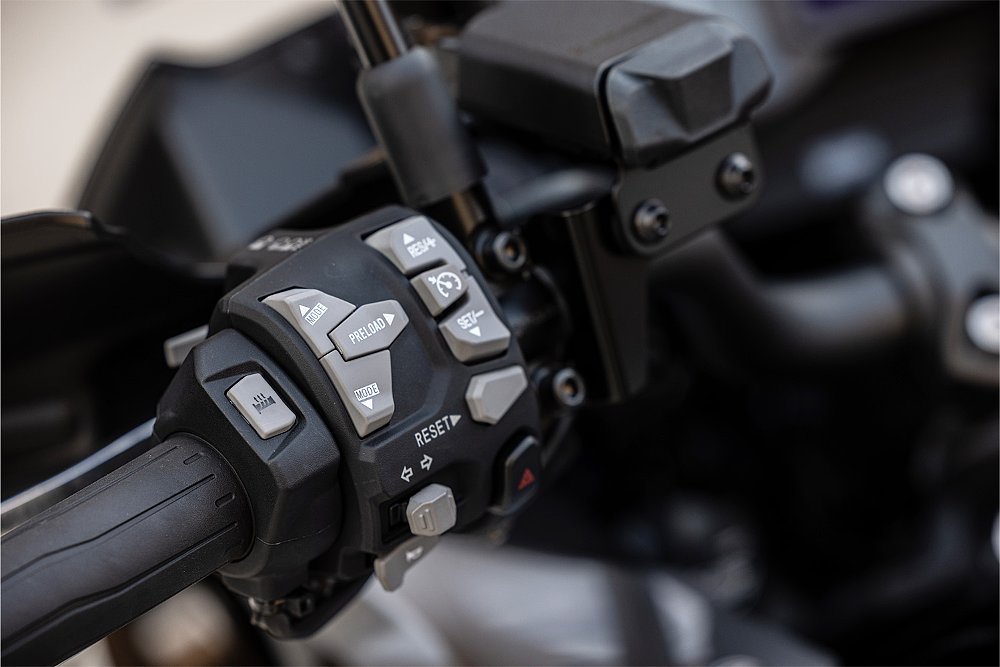 The Kawasaki Versys 1100 SE LT's switchgear controls pictured up close.