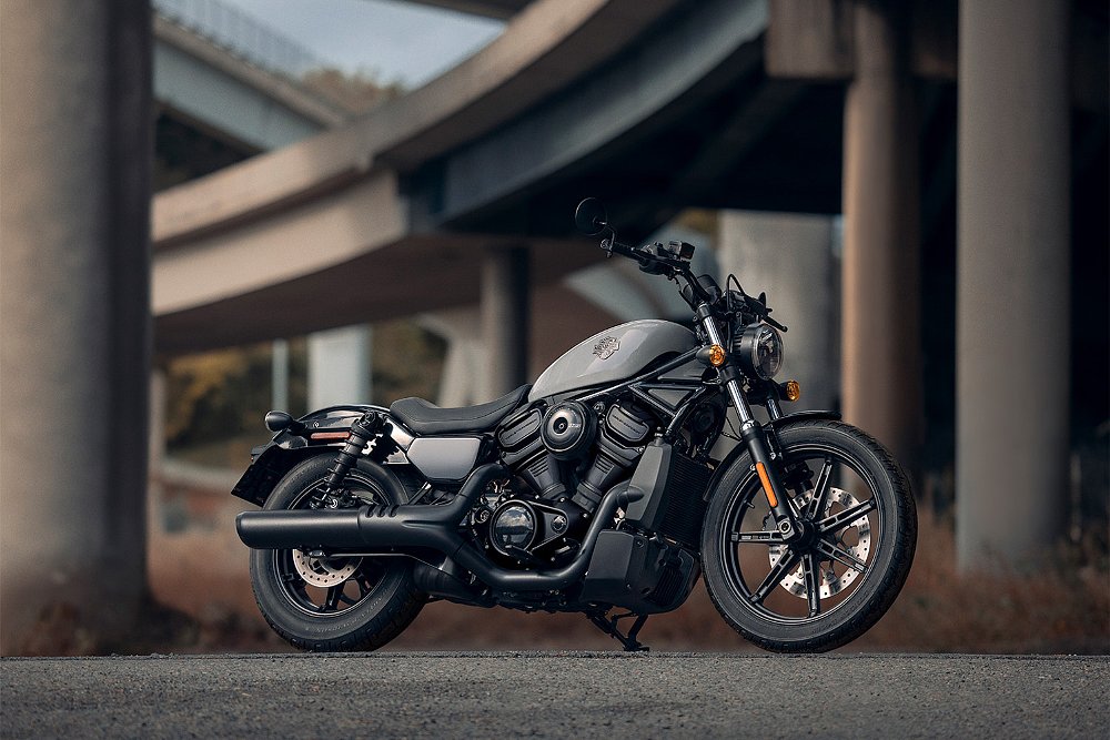 The 2025 Harley-Davidson Nightster pictured beneath elevated freeway junctions.