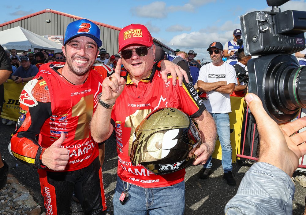 Herrin and Ferracci display the number one plate for a TV camera