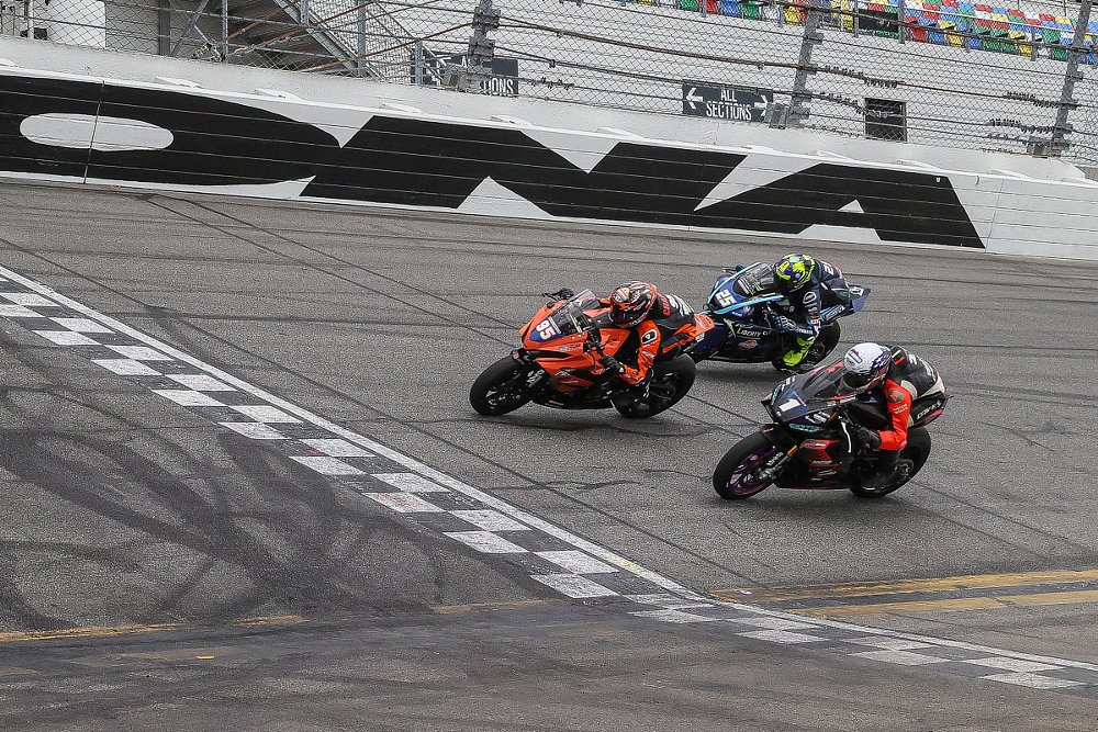 top three finishers in Twins Cup crossing the finish line at Daytona International Speedway