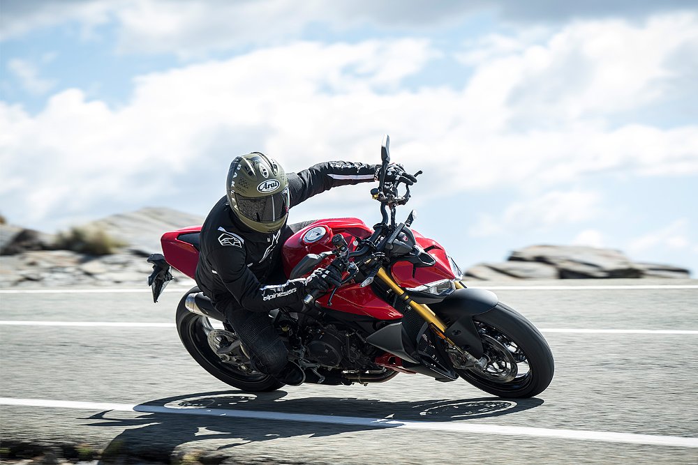 Dustin riding the Streetfighter V2 S through a sweeping corner.