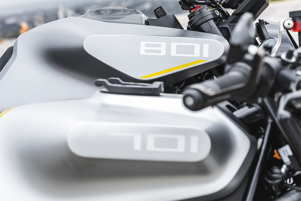 A close-up of gas tanks on the Husqvarna Vitpilen 801 and 701.