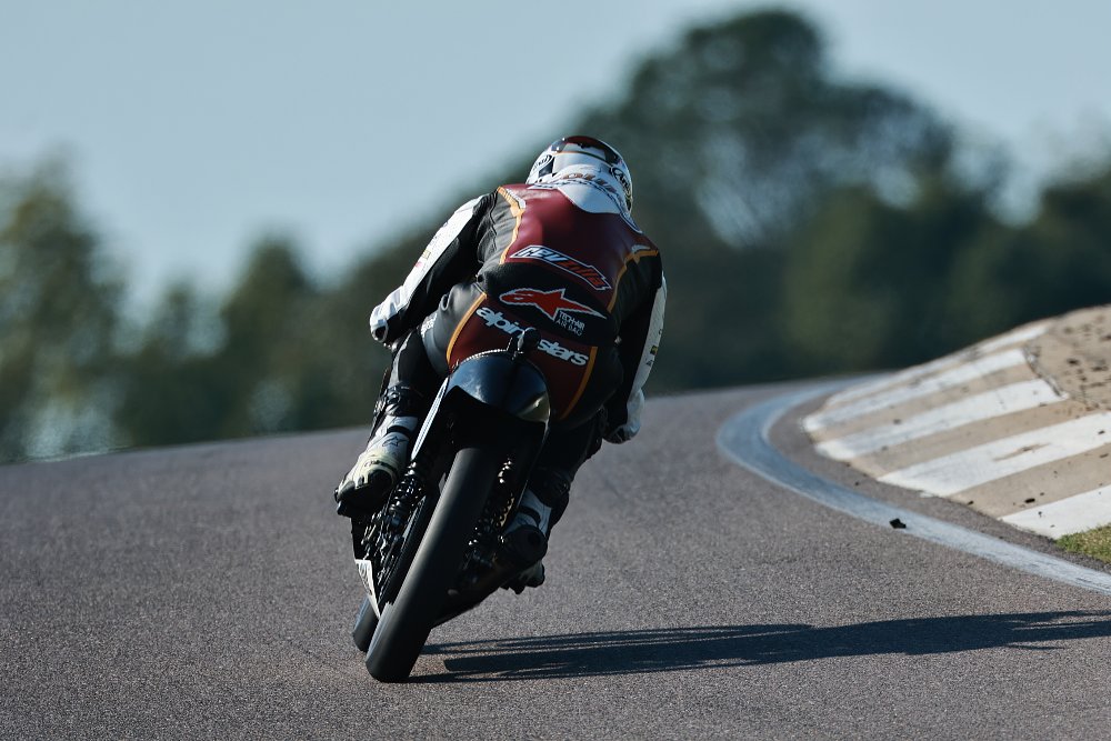 AJS 7R riding away through Turn 4 at Barber Motorsports Park.