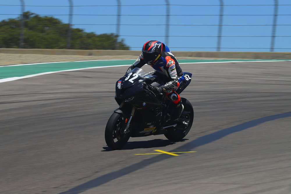 BMW S 1000 RR riding through The Corkscrew at Laugna Seca Raceway.