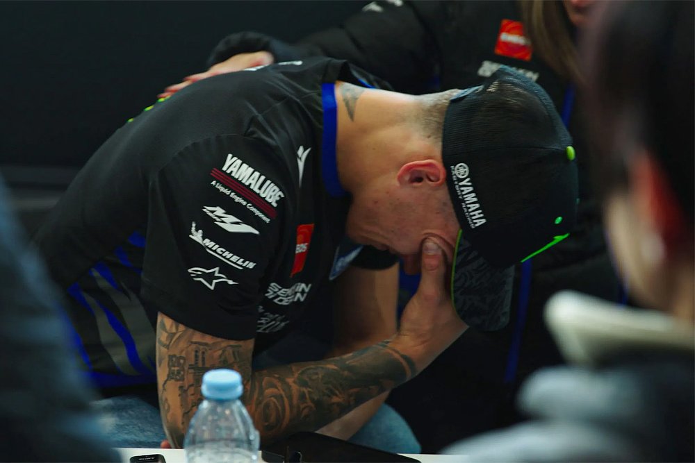 Fabio Quartararo doubles over in disappointment after a mechanical disqualification from the British Grand Prix.