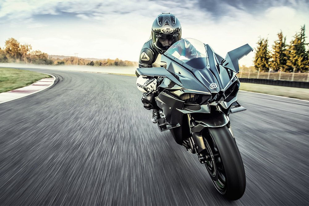 An H2 R rider negotiates a turn on the track.