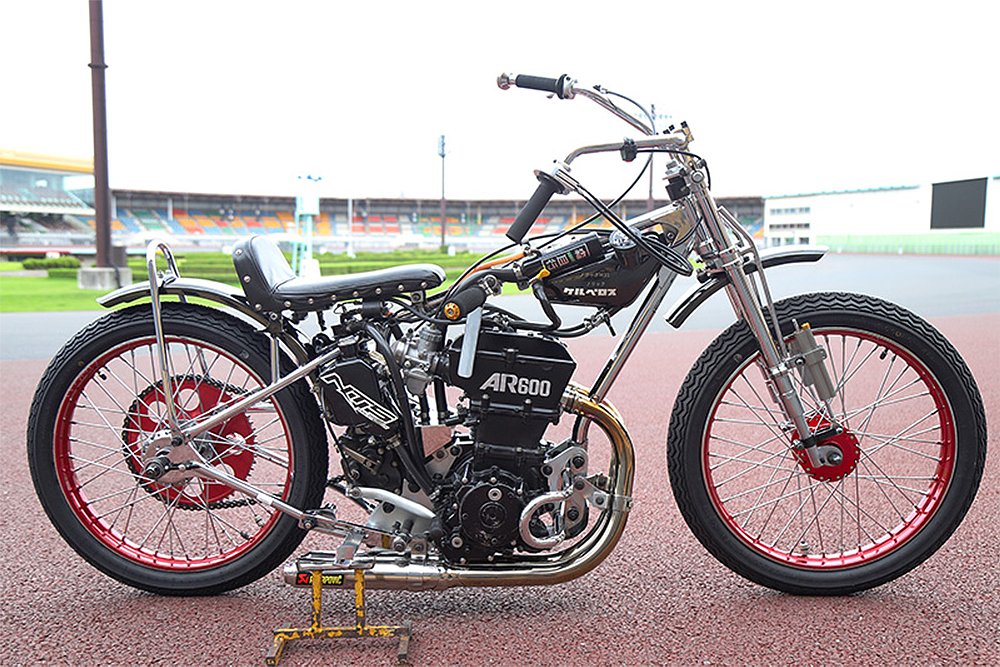 An auto race motorcycle staged along the Kawaguchi Auto Race Circuit track.