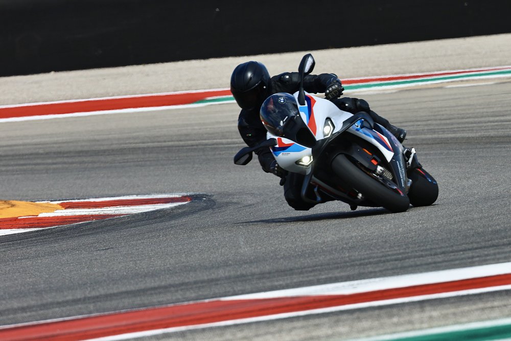 2025 BMW S 1000 RR going through a right-hand corner, ridden by BMW CEO Markus Flasch.