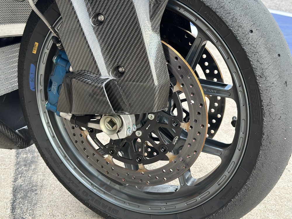 2025 alpha Racing M 1000 RR front wheel and brake detail.