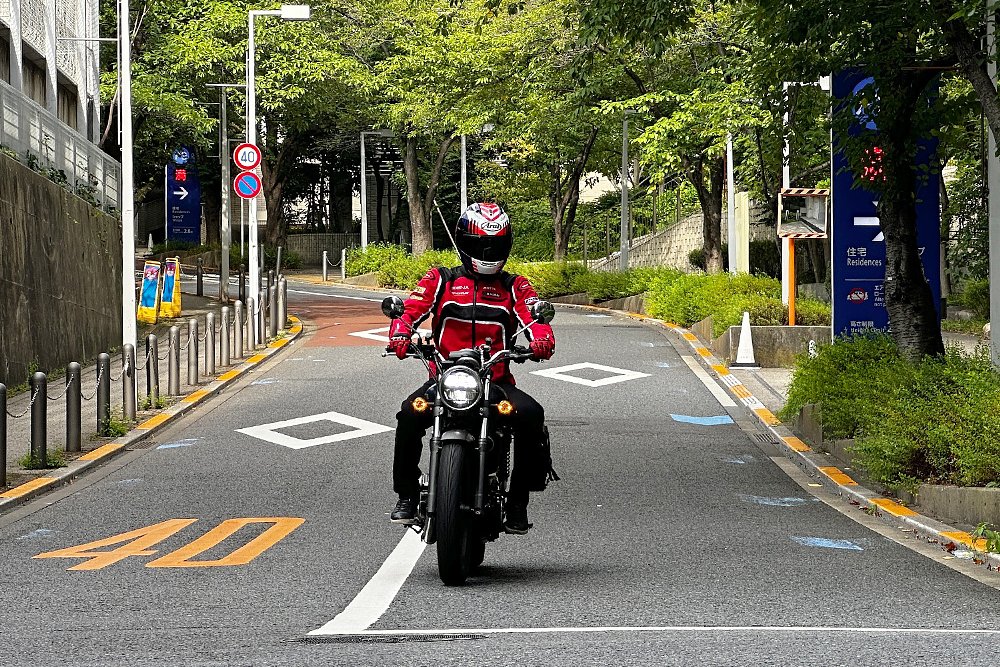 Dustin rides the Honda GB350 down a Tokyo side street.