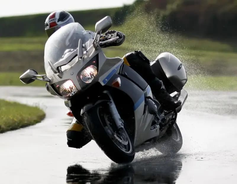 Michelin Pilot Road 4 GT tire showcasing XST+ siping for wet grip