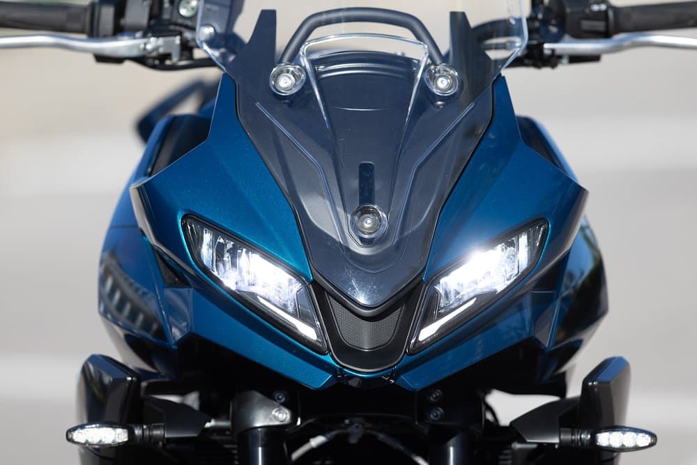 front view of the wider blue fairing on the Tiger Sport 660