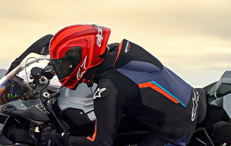 FIM-certified motorcycle helmet — MotoGP-grade rotational and high-speed impact protection